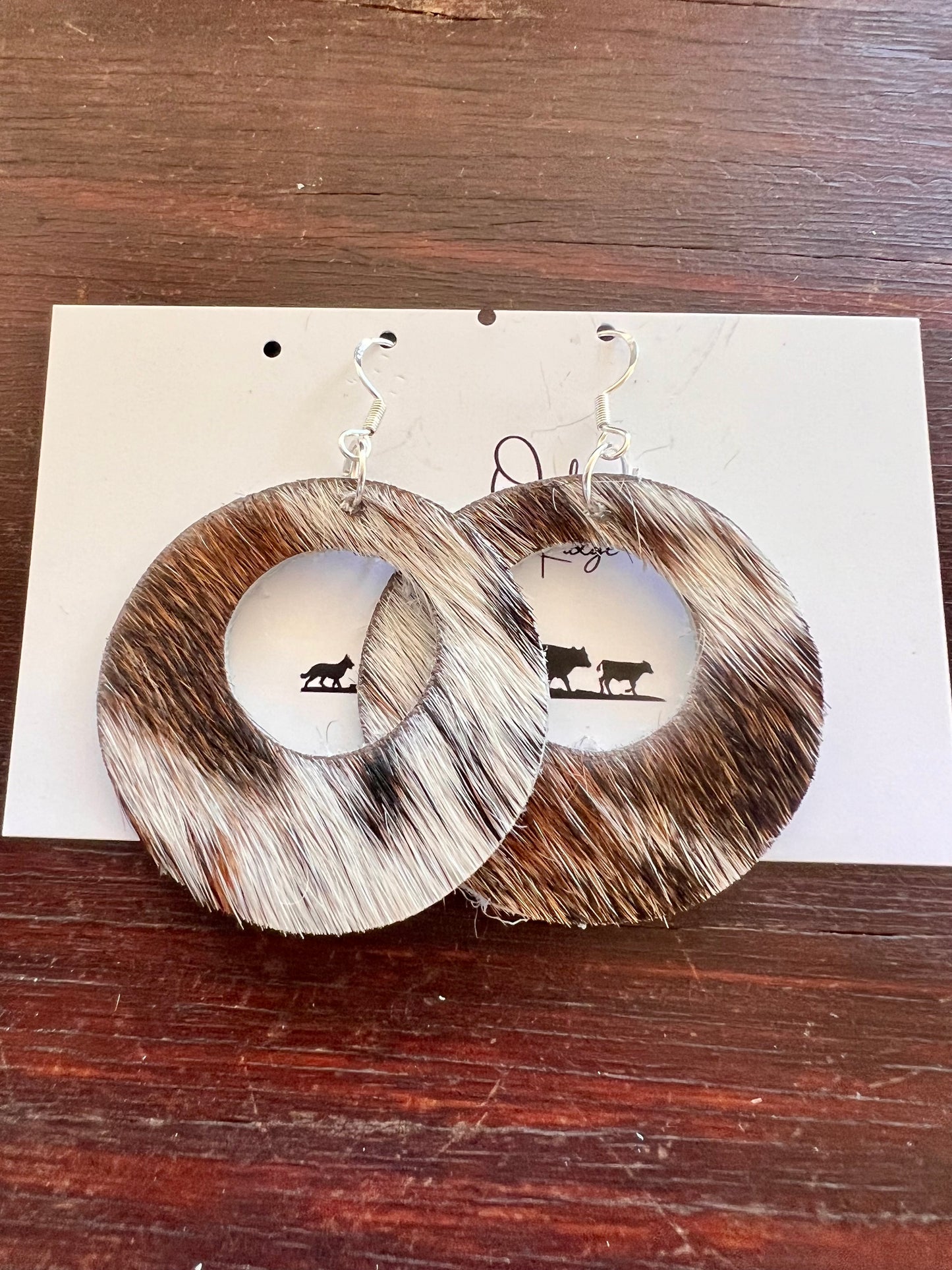 Cowhide round dangles